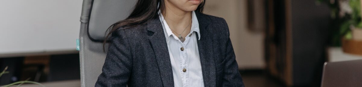 Female accountant working at a computor