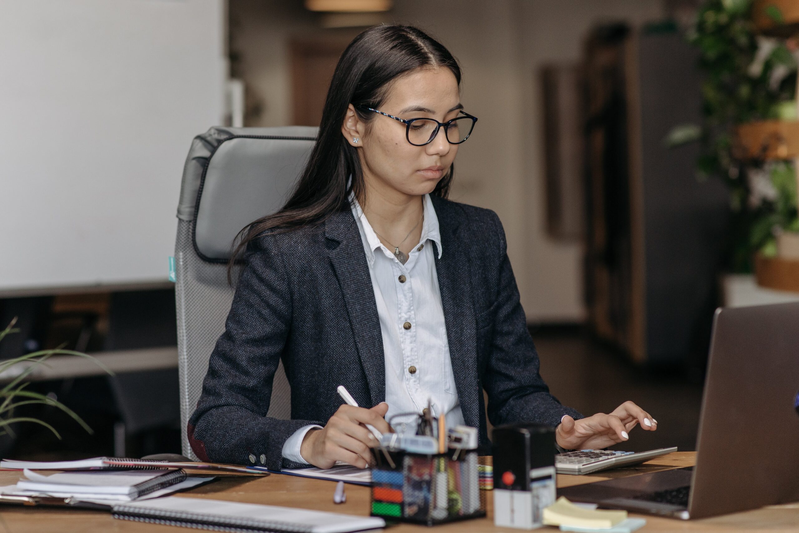 Female accountant working at a computor