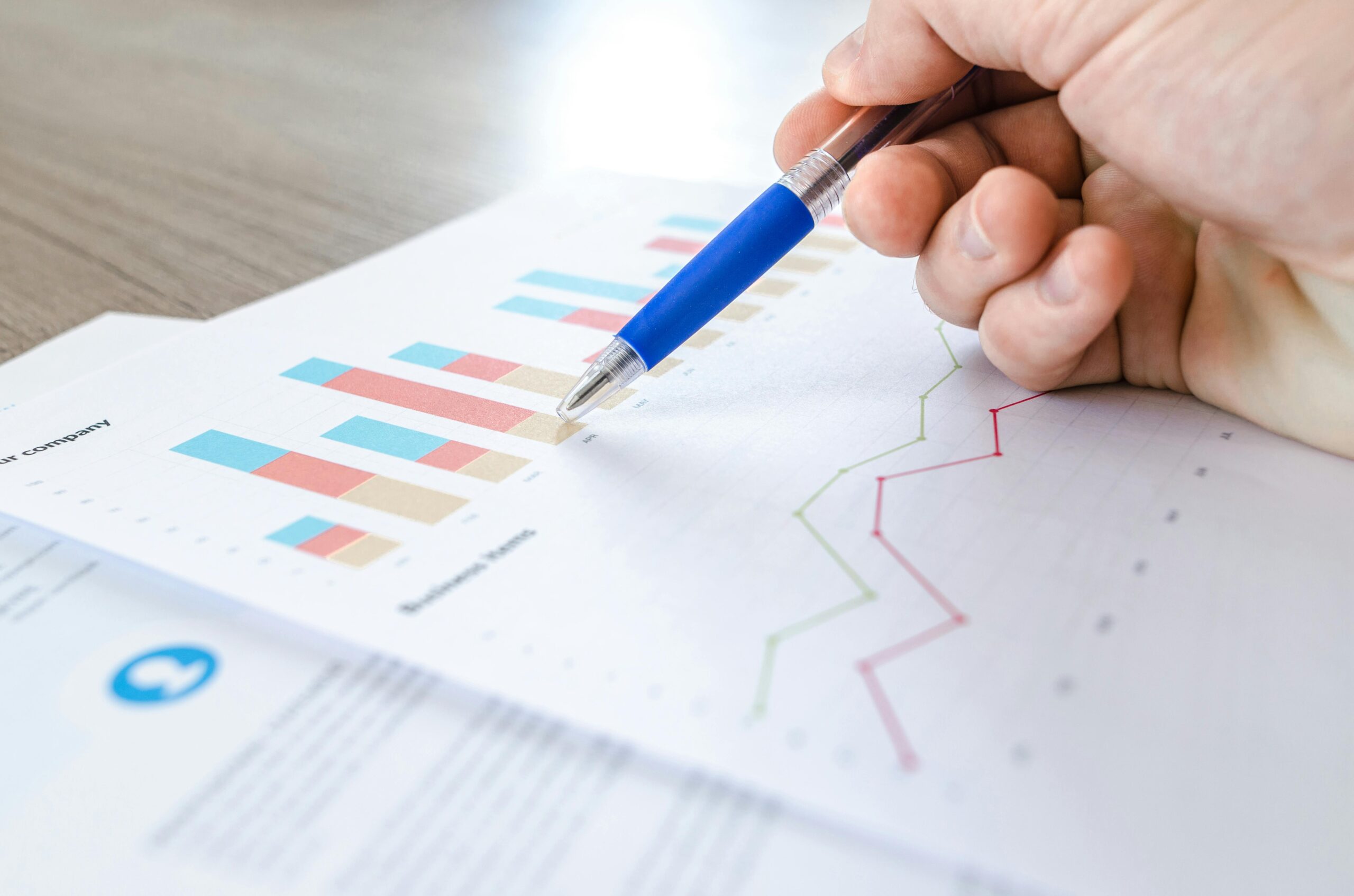 Image of someone checking figures on a report